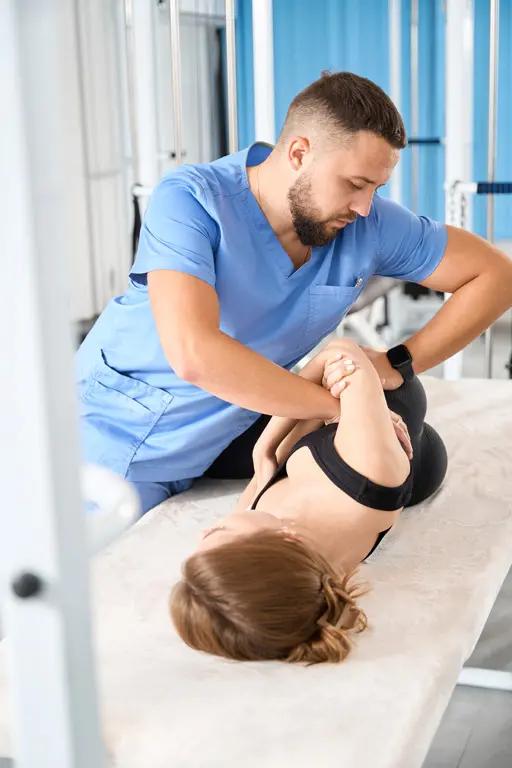 Patient Lies On A Manual Therapy Table